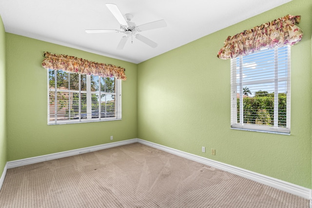 6346 San Michel Way, Delray Beach, FL 33484 - empty room featuring carpet floors, plenty of natural light, and baseboards
