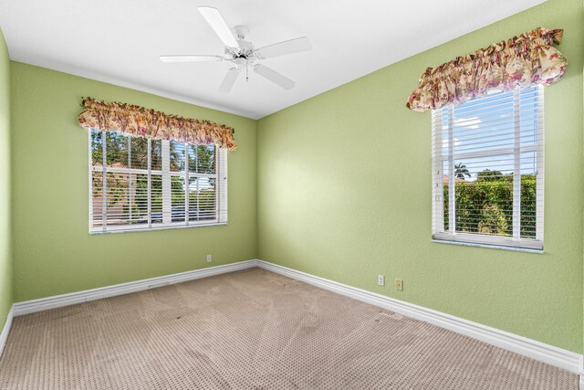 6346 San Michel Way, Delray Beach, FL 33484 - empty room featuring carpet, a ceiling fan, and baseboards