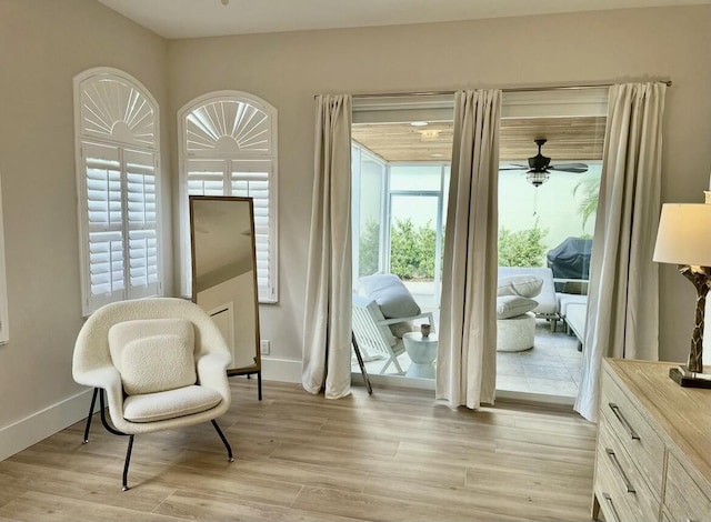 12624 Mallet Cir, Wellington, FL 33414 - sitting room featuring baseboards, light wood-style floors, and ceiling fan