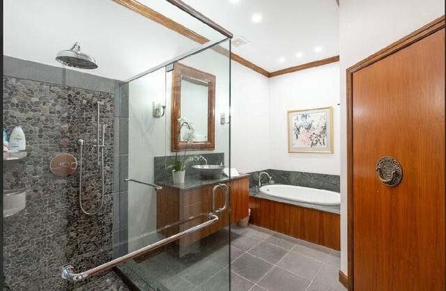 12624 Mallet Cir, Wellington, FL 33414 - full bath with tile patterned floors, vanity, a shower stall, a bath, and ornamental molding