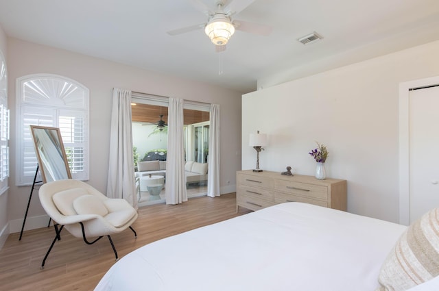 12624 Mallet Cir, Wellington, FL 33414 - bedroom featuring light wood-type flooring, baseboards, ceiling fan, and access to outside