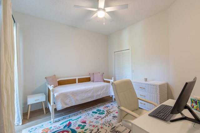 12624 Mallet Cir, Wellington, FL 33414 - bedroom with wood finished floors, a closet, a ceiling fan, and baseboards