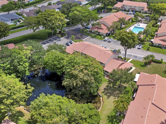 aerial view with a water view and a residential view