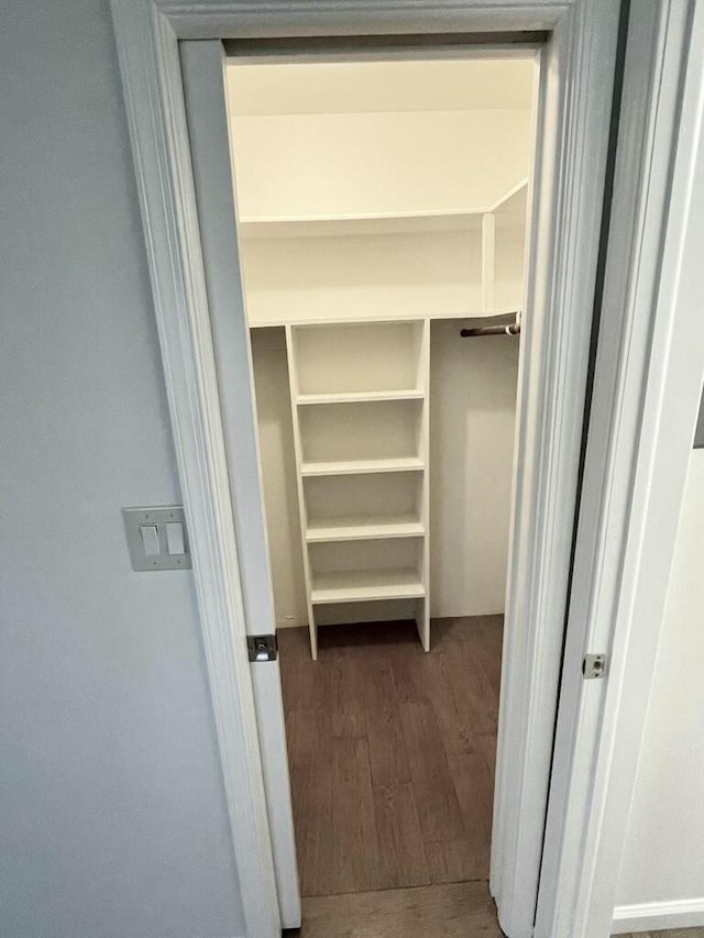 6401 NE 7th Ave, Boca Raton, FL 33487 - spacious closet featuring wood finished floors