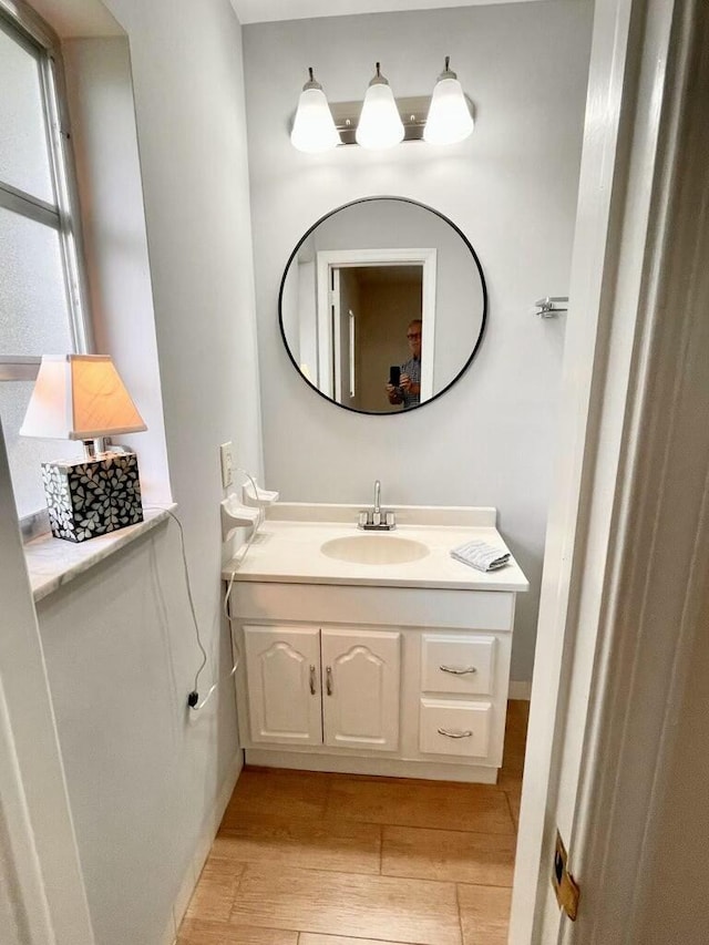 6401 NE 7th Ave, Boca Raton, FL 33487 - bathroom with vanity and wood finished floors