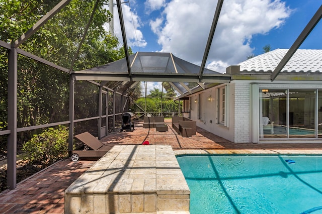 exterior space with an outdoor living space, a patio, and a lanai