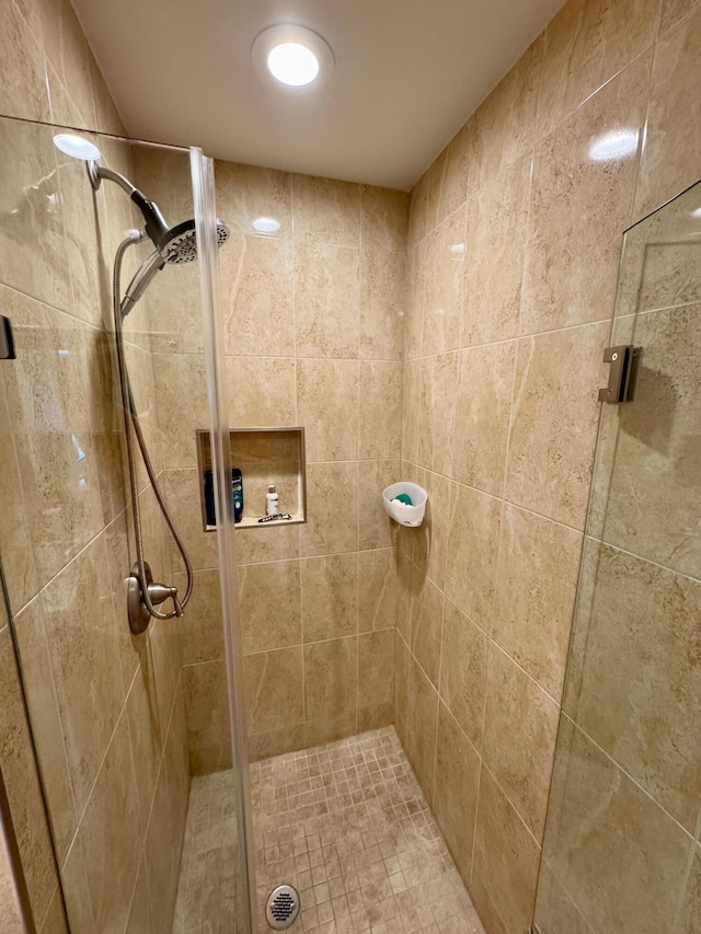 full bathroom with a shower stall