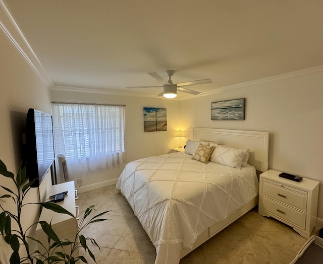 bedroom featuring baseboards, ceiling fan, and crown molding