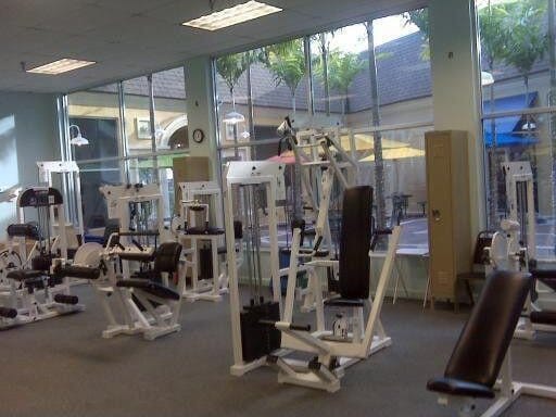 exercise room featuring a wealth of natural light and expansive windows