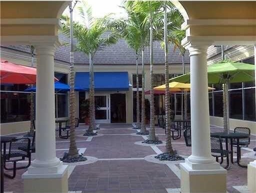 surrounding community featuring a patio