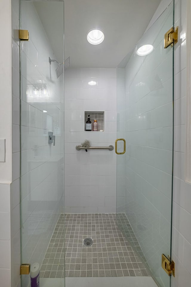 full bathroom featuring a shower stall