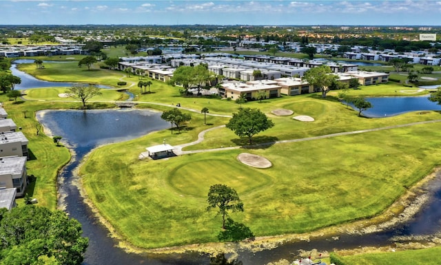 aerial view featuring a water view and view of golf course