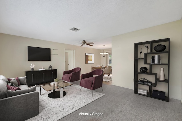 7140 Bobalink Ct, Lake Worth, FL 33467 - spare room featuring visible vents, baseboards, light carpet, and ceiling fan with notable chandelier