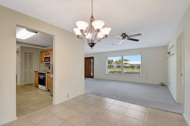 7140 Bobalink Ct, Lake Worth, FL 33467 - kitchen with an inviting chandelier, appliances with stainless steel finishes, light brown cabinetry, and a sink