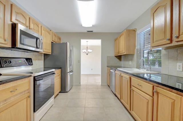7140 Bobalink Ct, Lake Worth, FL 33467 - kitchen with dishwasher, light brown cabinets, backsplash, and a sink