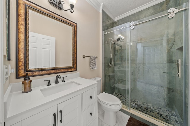 full bath with toilet, vanity, ornamental molding, a textured ceiling, and a stall shower
