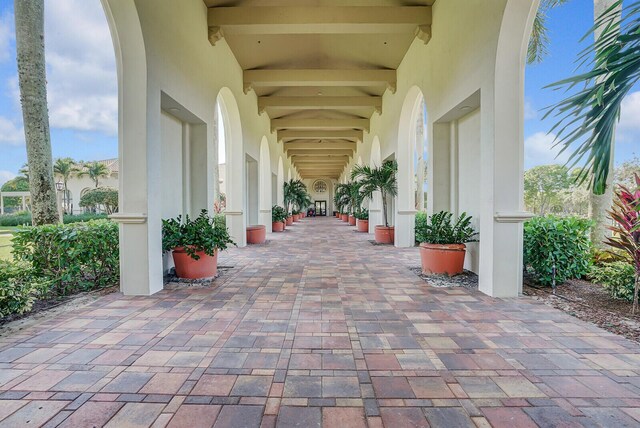entrance to property with stucco siding