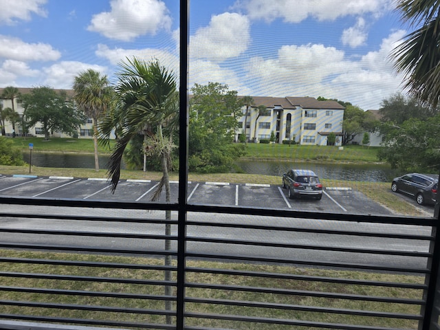 exterior space with a parking lot