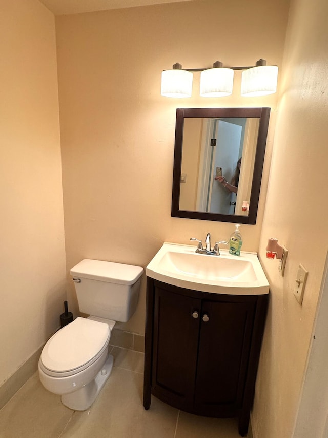 3779 Carambola Cir N Unit 28102, Coconut Creek, FL 33066 - bathroom featuring vanity, toilet, and tile patterned floors