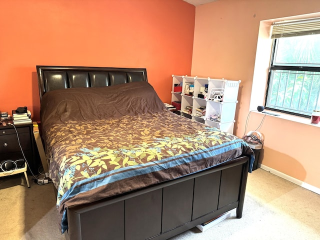 3779 Carambola Cir N Unit 28102, Coconut Creek, FL 33066 - bedroom with light colored carpet and baseboards