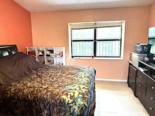 3779 Carambola Cir N Unit 28102, Coconut Creek, FL 33066 - bedroom featuring light colored carpet and baseboards