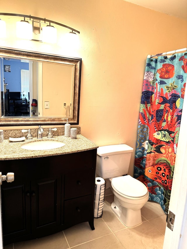 3779 Carambola Cir N Unit 28102, Coconut Creek, FL 33066 - full bath featuring tile patterned floors, vanity, toilet, and a shower with shower curtain