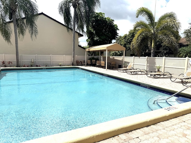 3779 Carambola Cir N Unit 28102, Coconut Creek, FL 33066 - community pool with a gazebo and a patio area