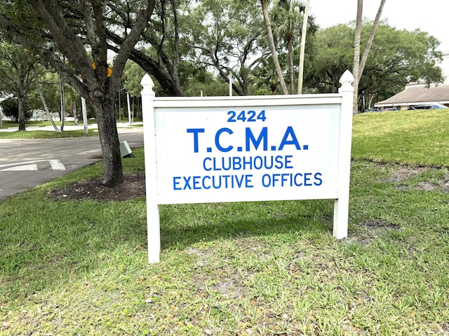 3779 Carambola Cir N Unit 28102, Coconut Creek, FL 33066 - community sign featuring a yard