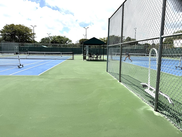 3779 Carambola Cir N Unit 28102, Coconut Creek, FL 33066 - view of tennis court