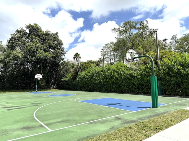 3779 Carambola Cir N Unit 28102, Coconut Creek, FL 33066 - view of sport court featuring community basketball court and view of scattered trees