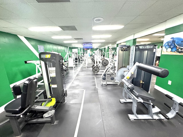 3779 Carambola Cir N Unit 28102, Coconut Creek, FL 33066 - gym featuring a drop ceiling and baseboards