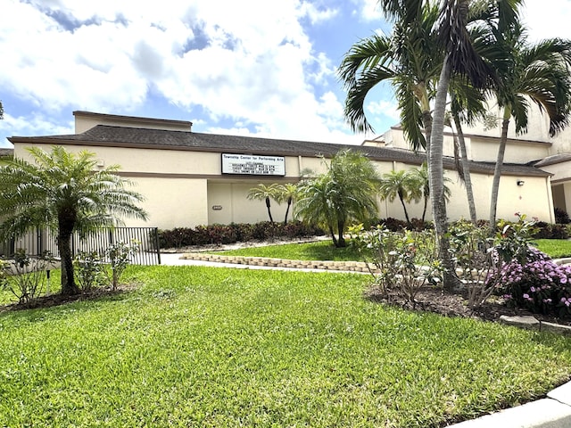 3779 Carambola Cir N Unit 28102, Coconut Creek, FL 33066 - view of side of home with stucco siding