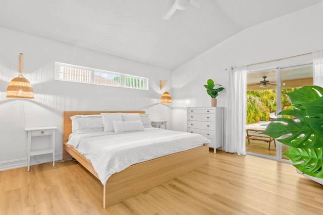 bedroom featuring vaulted ceiling, light wood-type flooring, and ceiling fan