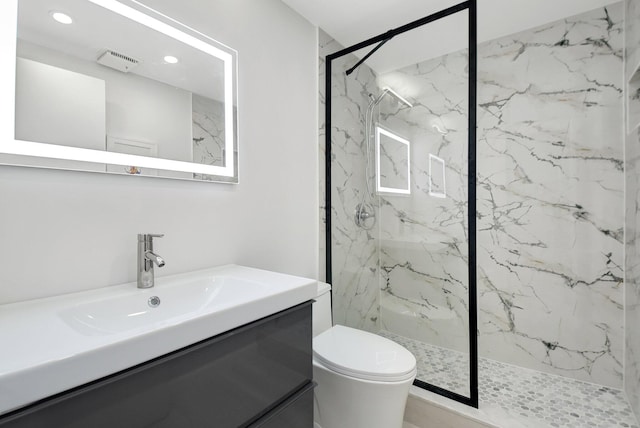 373 Piedmont H, Delray Beach, FL 33484 - bathroom with toilet, vanity, a marble finish shower, and visible vents