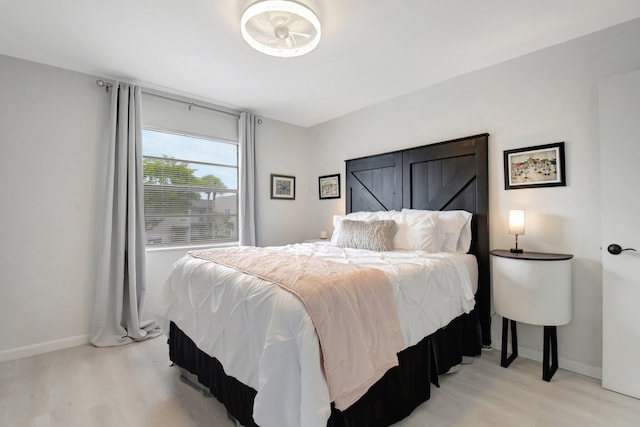 373 Piedmont H, Delray Beach, FL 33484 - bedroom featuring light wood finished floors and baseboards
