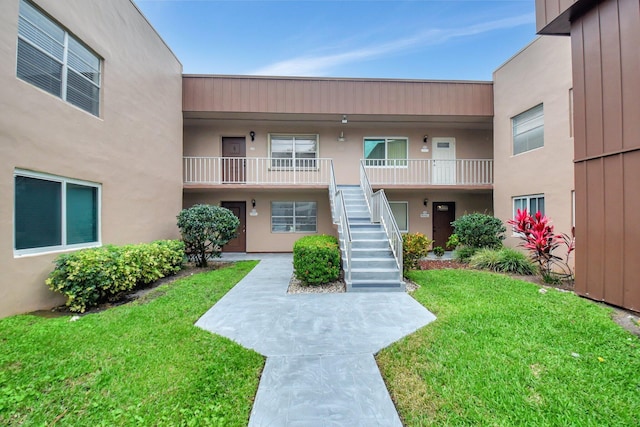 373 Piedmont H, Delray Beach, FL 33484 - view of property featuring stairs