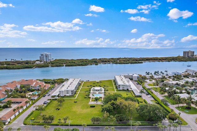 birds eye view of property featuring a water view