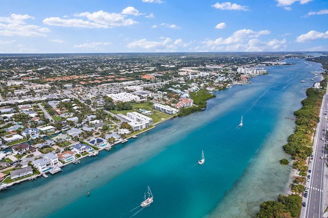 bird's eye view with a beach view and a water view