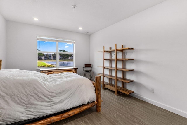 7113 Peters Ln, Delray Beach, FL 33446 - bedroom featuring recessed lighting, baseboards, and wood finished floors