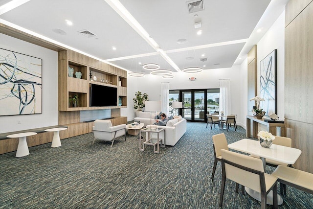 7113 Peters Ln, Delray Beach, FL 33446 - living area featuring dark carpet, visible vents, and recessed lighting