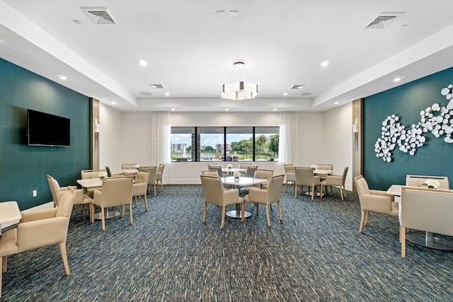 7113 Peters Ln, Delray Beach, FL 33446 - dining space featuring recessed lighting, carpet, and visible vents
