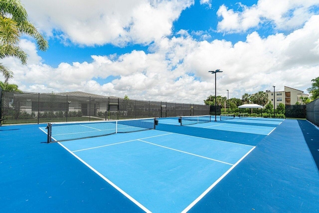7113 Peters Ln, Delray Beach, FL 33446 - view of tennis court with fence