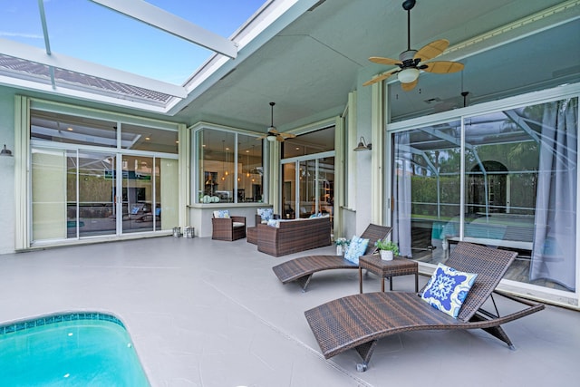 view of patio with an outdoor living space, an outdoor pool, glass enclosure, and a ceiling fan