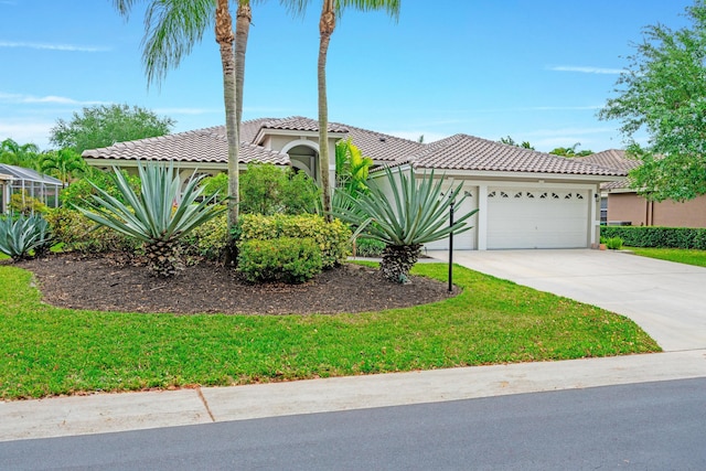 mediterranean / spanish-style house featuring an attached garage, driveway, stucco siding, and a tile roof