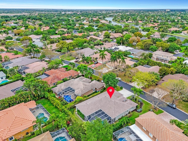 aerial view featuring a water view and a residential view