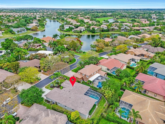 aerial view featuring a residential view and a water view