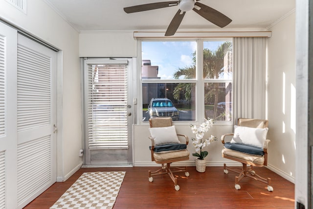 230 NE 26th Ave Unit 1030, Boynton Beach, FL 33435 - sitting room featuring crown molding, baseboards, visible vents, ceiling fan, and wood finished floors