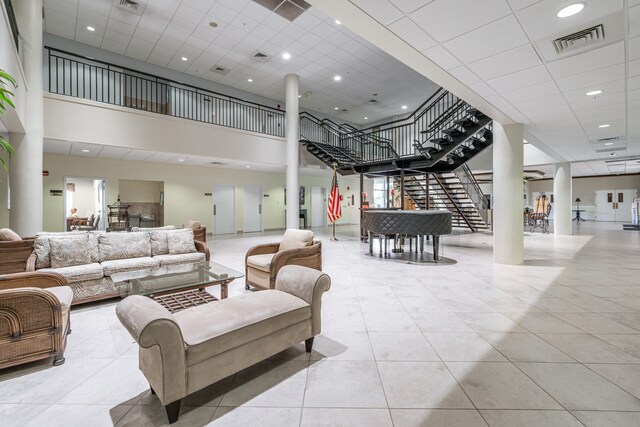 230 NE 26th Ave Unit 1030, Boynton Beach, FL 33435 - building lobby with stairway and visible vents