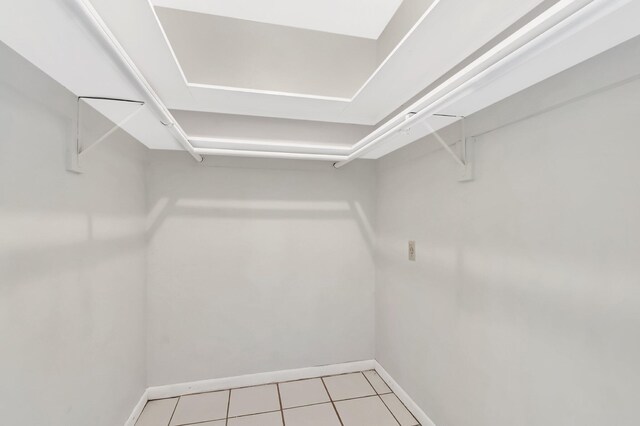 1746 W Terrace Dr, Lake Worth, FL 33460 - walk in closet with light tile patterned flooring