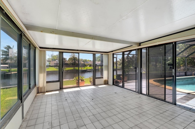 1746 W Terrace Dr, Lake Worth, FL 33460 - unfurnished sunroom featuring a water view
